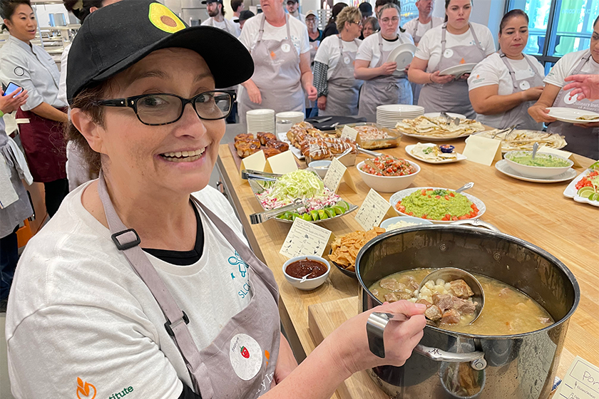 Stephanie Macias shows off her pork pozole.