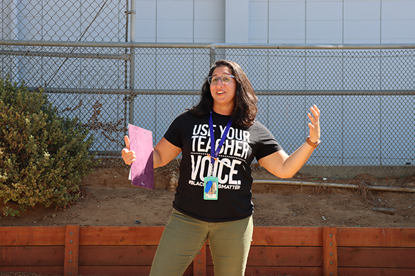 Maricela Archer, Gage Middle School biology teacher, shows off the site that will soon become a school garden